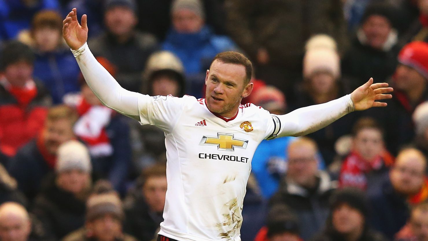 Wayne Rooney celebrates his winning goal for Manchester United at Liverpool, his 176th Premier League goal.