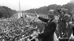 Martin Luther King Jr. waves to supporters from the steps of the Lincoln Memorial on August 28, 1963, during the march on Washington, when King delivered his famous "I Have a Dream" speech.