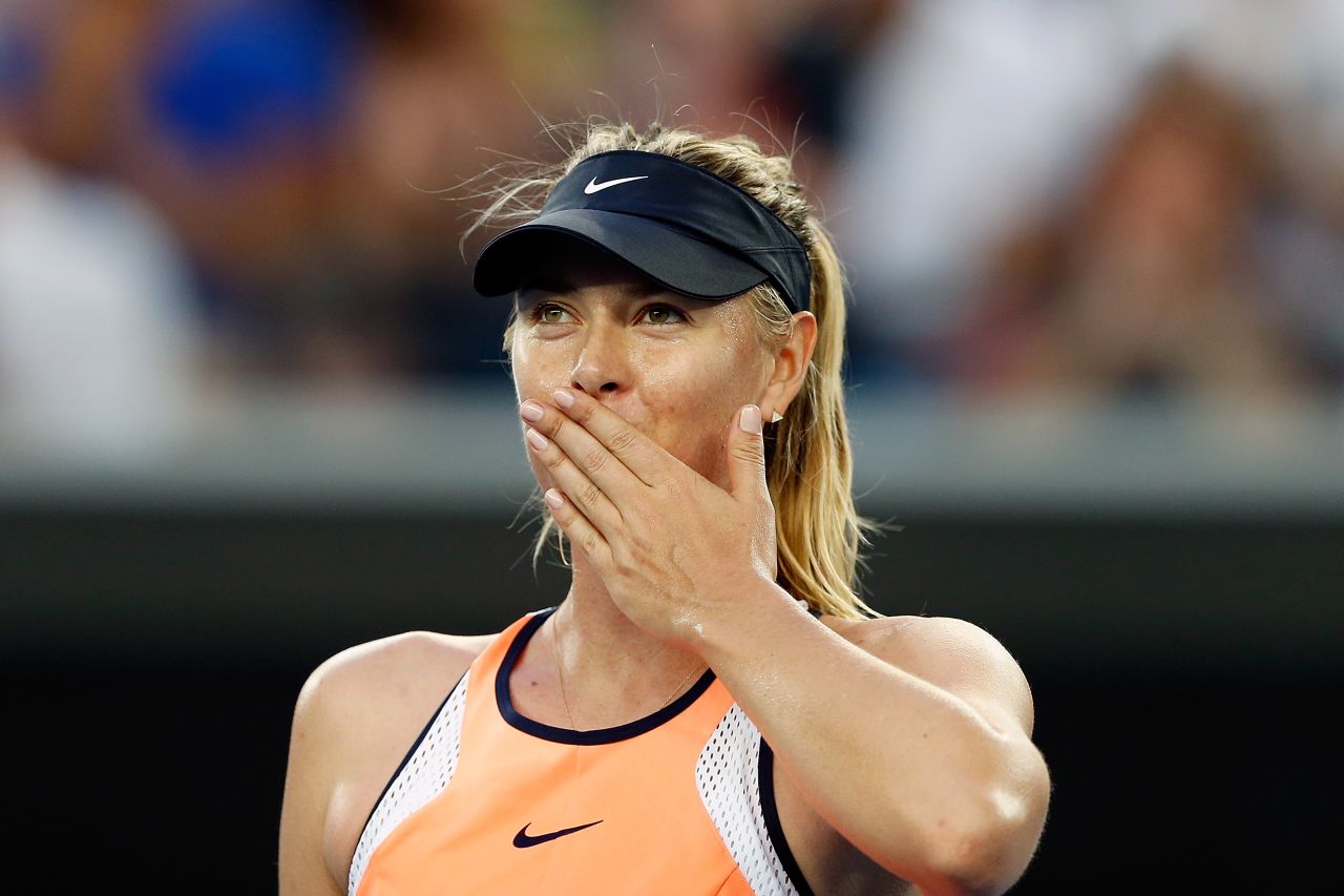 Last year's losing finalist Maria Sharapova celebrates after an easy victory in her first-round match against Japan's grand slam debutante Nao Hibino.