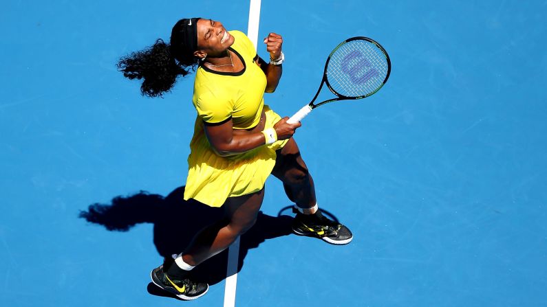 Serena Williams celebrates a point during her first-round win at the Australian Open on Monday, January 18. Williams won the tournament last year.
