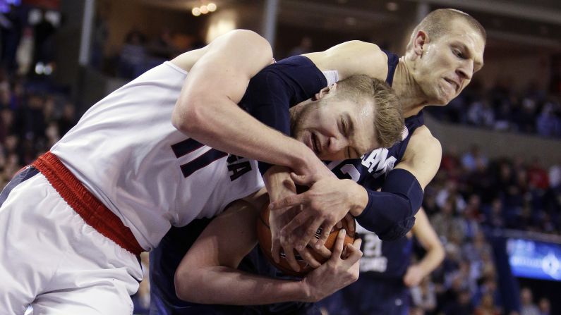 Gonzaga's Domantas Sabonis, left, and BYU's Nate Austin battle for a rebound during a game in Spokane, Washington, on Thursday, January 14.