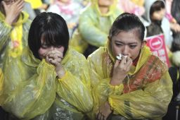 Emotional supporters react after Tsai lost her 2012 bid for the presidency.