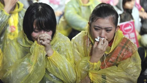 Emotional supporters react after Tsai lost her 2012 bid for the presidency.