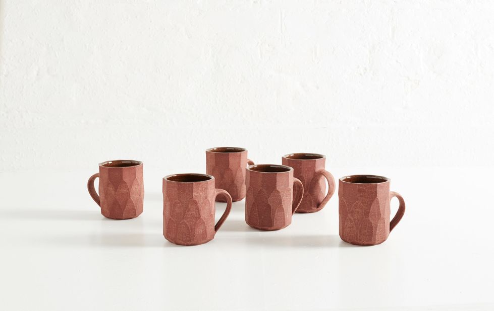 Nicola Tassie's Faceted Collection of stone jugs and mugs make morning coffee a little more interesting. 