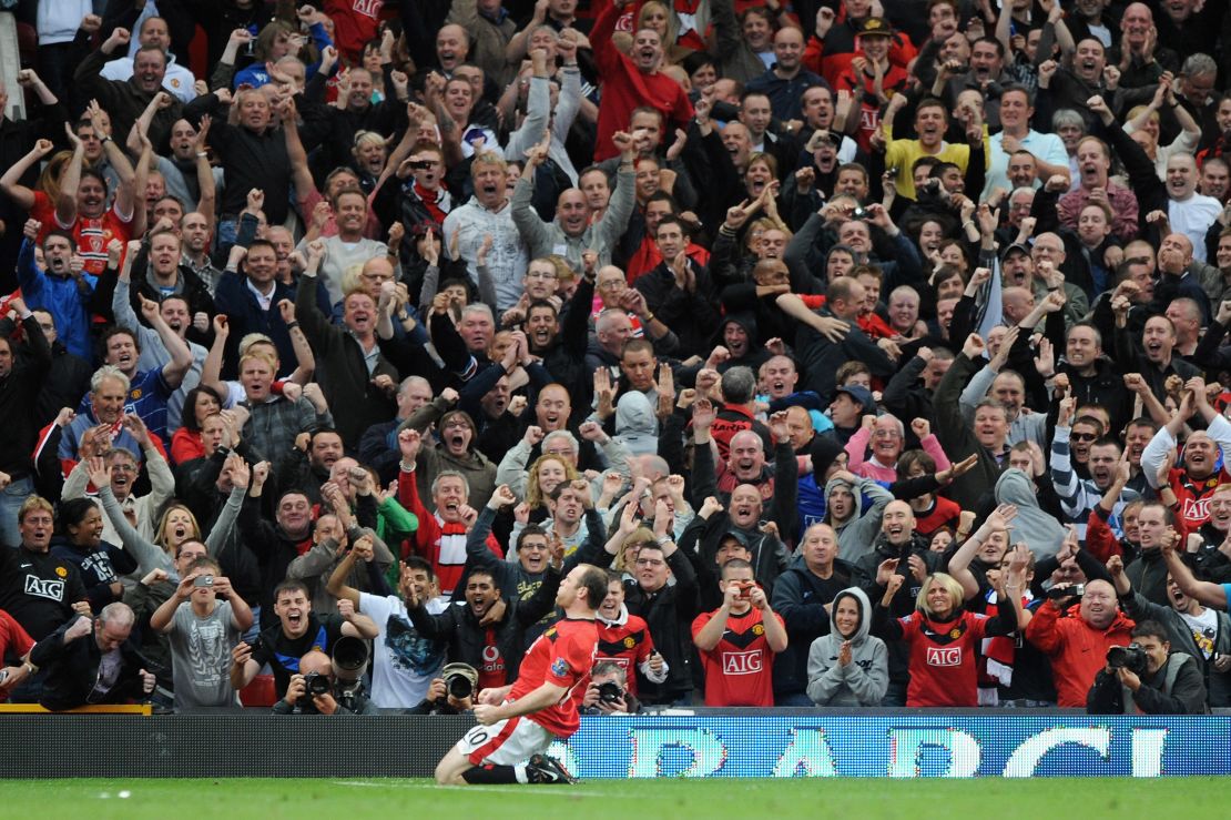 Rooney celebrates after scoring during a league match against Arsenal at Manchester's Old Trafford on August 29, 2009.