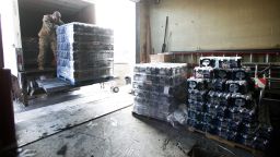 FLINT, MI - JANUARY 13:   Michigan National Guard Staff Sergeant William Phillips of Birch Run, Michigan, helps unload pallets of bottled water at a Flint Fire Station January 13, 2016 in Flint, Michigan. On Tuesday, Michigan Gov. Rick Snyder activated the National Guard to help the American Red Cross distribute water to Flint residents to help them deal with the lead contamination that is in the City of Flint's water supply.  (Photo by Bill Pugliano/Getty Images)