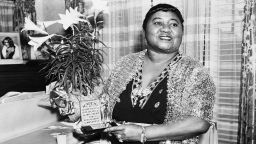 American actress Hattie McDaniel (1895 - 1952) with her Academy Award of Merit for Outstanding Achievement, circa 1945. McDaniel won an Oscar for Best Supporting Actress for her role of Mammy in 'Gone With The Wind', making her the first African-American to win an Academy Award. (Photo via John Kobal Foundation/Getty Images)