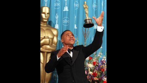 Cuba Gooding Jr. throws his Oscar into the air after being named best supporting actor for his role in "Jerry Maguire" in 1997. 