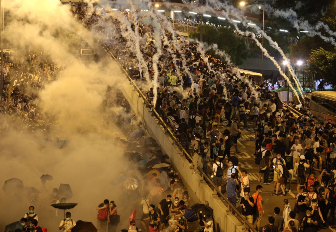 Police fire tear gas upon pro-democracy demonstrators near the Hong Kong government headquarters on September 28, 2014. 