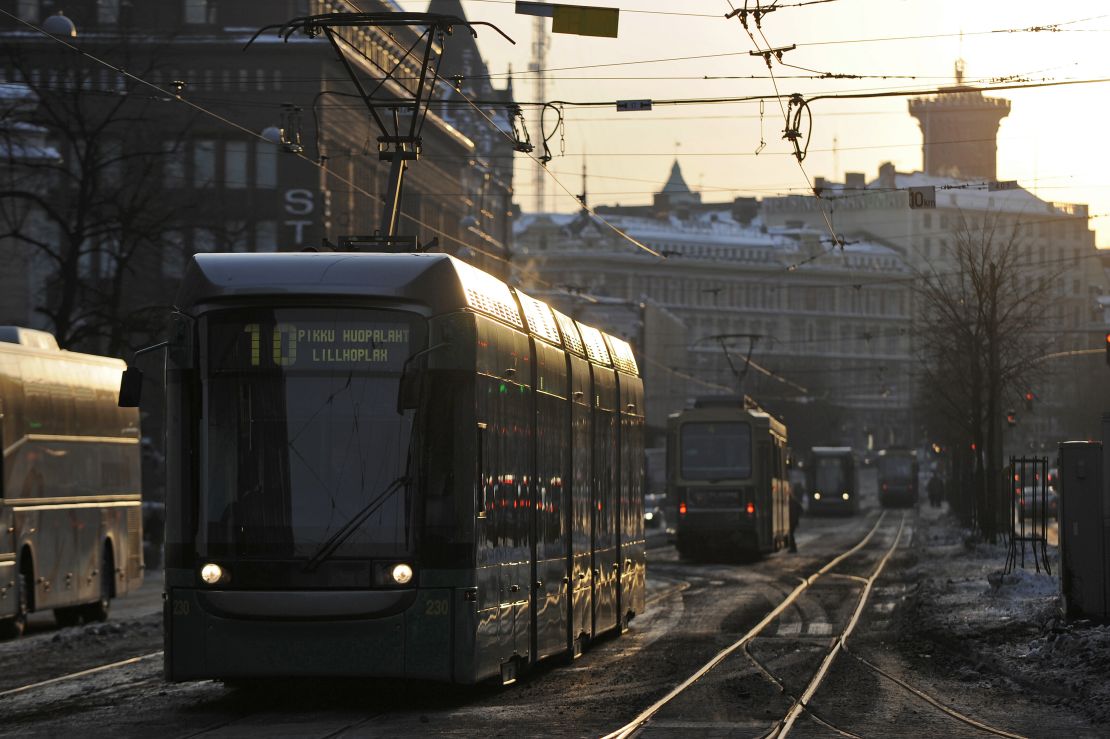 A tram passes through central Helsinki.