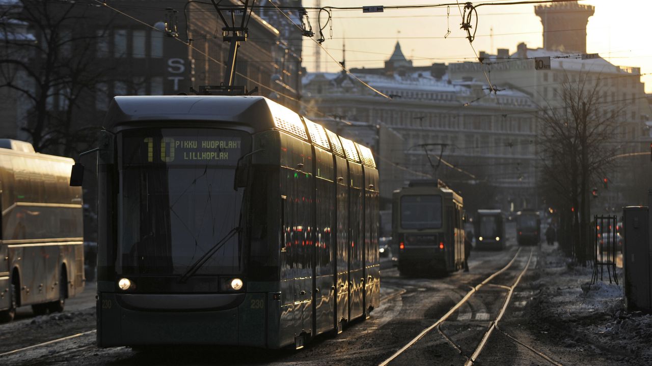 A tram passes through central Helsinki.