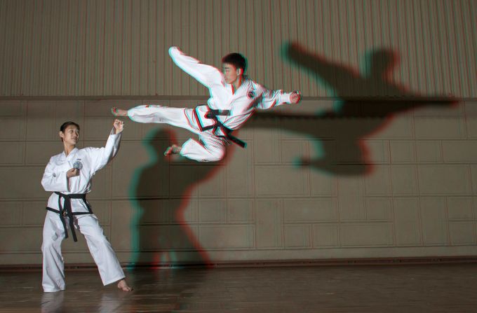 "They are youth champions from North Korea who travel round Asia doing competitions. In front of the sports hall there is a statue of a guy performing a kick in mid-air ... I asked them to recreate this and managed to shoot him doing the perfect kick."