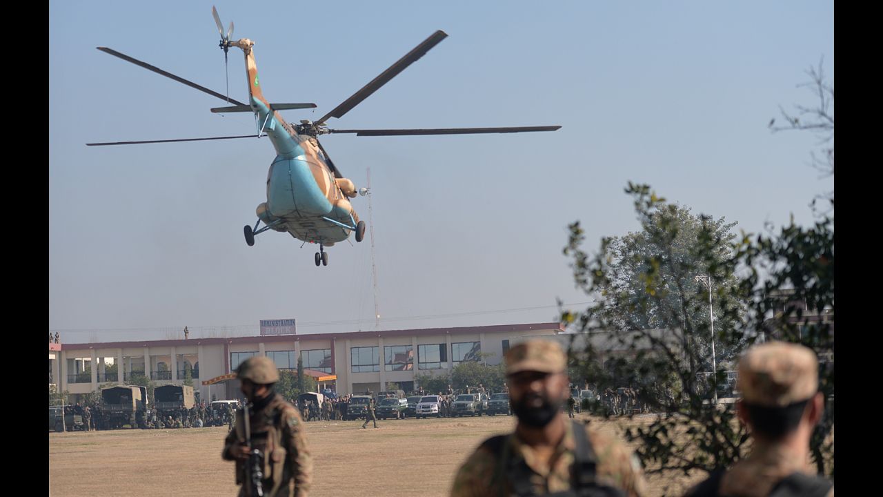 An army helicopter arrives at Bacha Khan University.