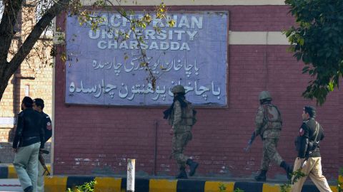 Soldiers conduct a search operation at the university.