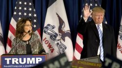 AMES, IA - JANUARY 19:   Republican presidential candidate Donald Trump acknowledges the crowd as former Alaska Gov. Sarah Palin speaks at Hansen Agriculture Student Learning Center at Iowa State University on January 19, 2016 in Ames, IA. Trump received Palin's endorsement at the event.  (Photo by Aaron P. Bernstein/Getty Images)