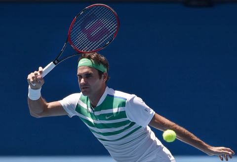 Switzerland's Roger Federer swept aside Ukraine's Alexandr Dolgopolov 6-3 7-5 6-1.