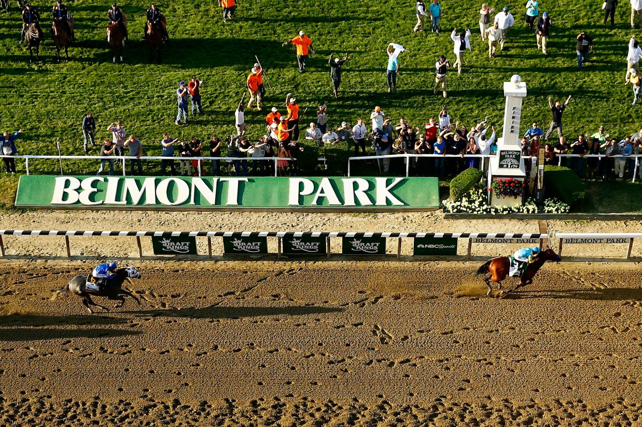 JUNE 06 2015: To the delight of the crowd and millions watching on television, Espinoza guides American Pharoah to the first Triple Crown in 37 years. The tension before the race was intense but jockey Espinoza was always confident. 