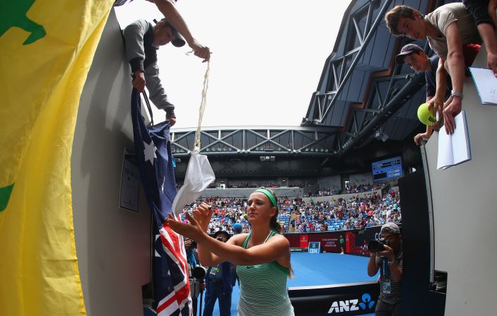 Victoria Azarenka signed autographs after thumping Danka Kovinic in the second round. 