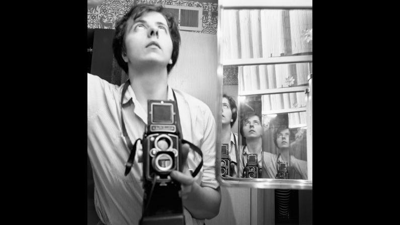 Throughout a number of Maier's self-portraits, there is the motif of a mirror, including in this one from 1956, where our eyes are left to confront layers upon layers of mirrors.