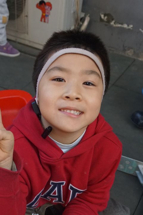 Born in 2009, Ke Yuan has been in care since March, 2015. He also suffers from aural atresia and is unable to hear. Children's Hope says he's a thoughtful boy who helps take care of the younger children. "Although he is shy when meeting strangers, he will be willing to talk once he gets familiar with them. Now, taking the initiative to learn to speak more words, Yuan has made huge progress."
