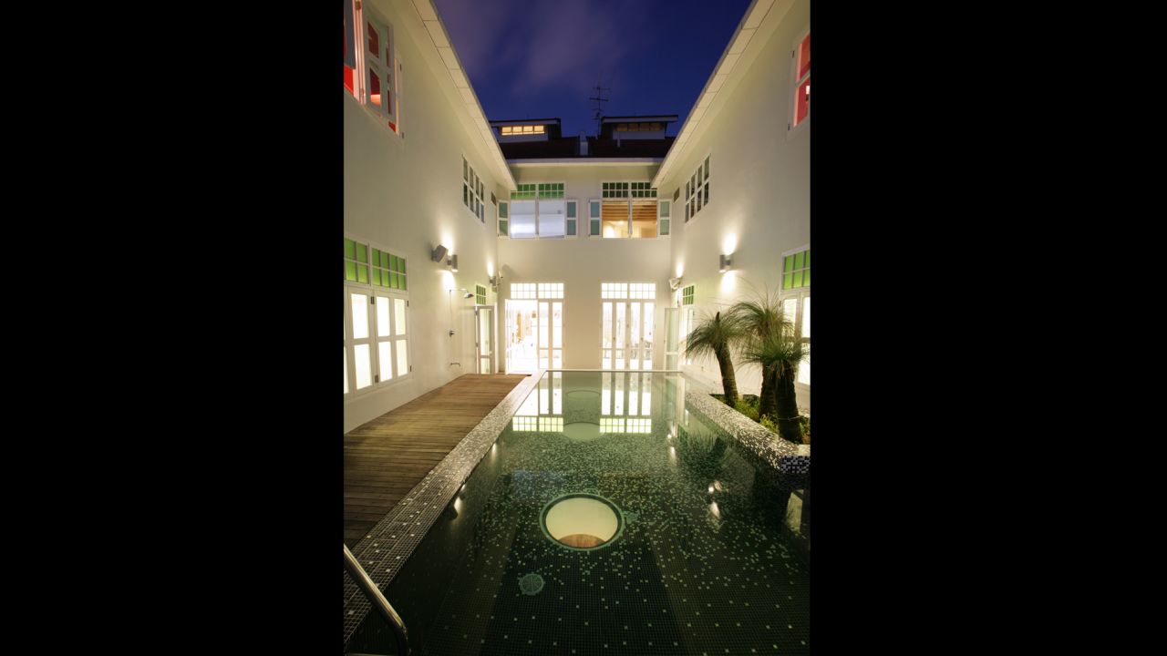 The New Majestic's compact swimming pool - with peek-a-boo portholes through to the hotel's restaurant.