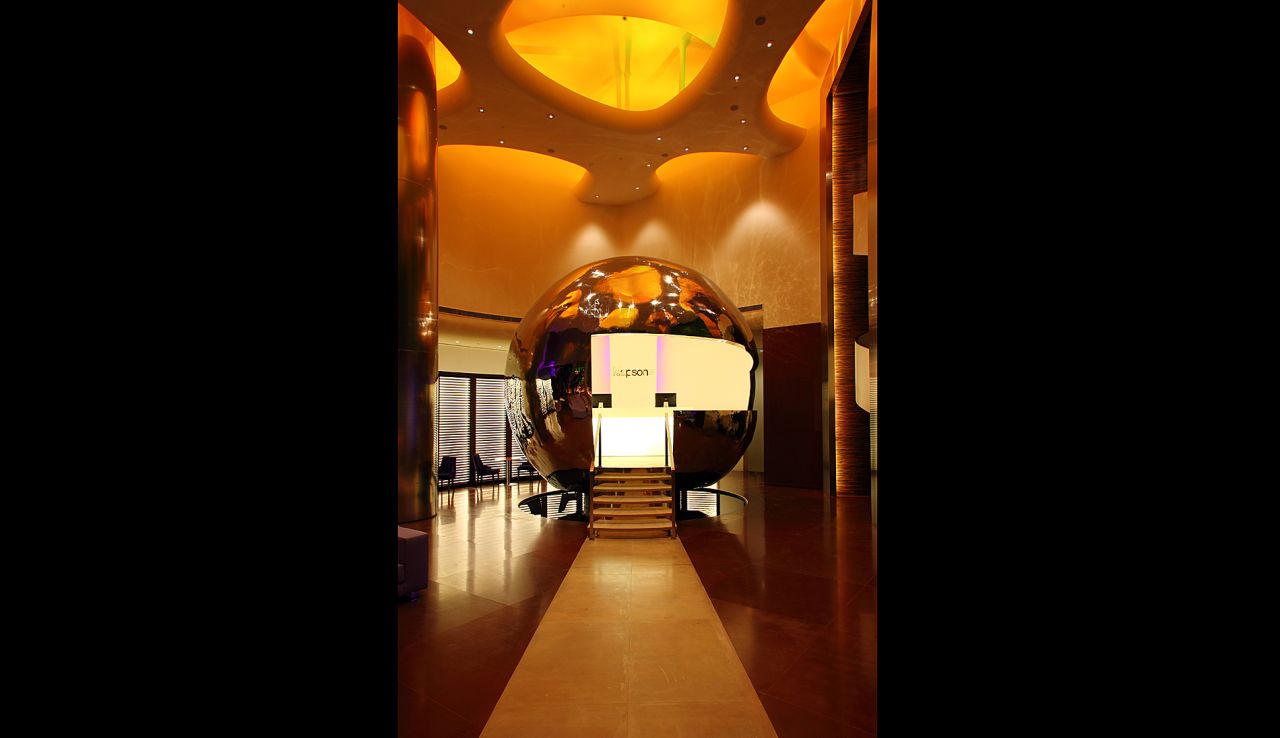 <strong>Klapstar:</strong> Floating in the middle of the hotel's lobby and apparently a breakthrough in civil engineering -- which we don't doubt -- is the handcrafted 5-meter steel sphere which serves as the hotel's reception and check-in point. 