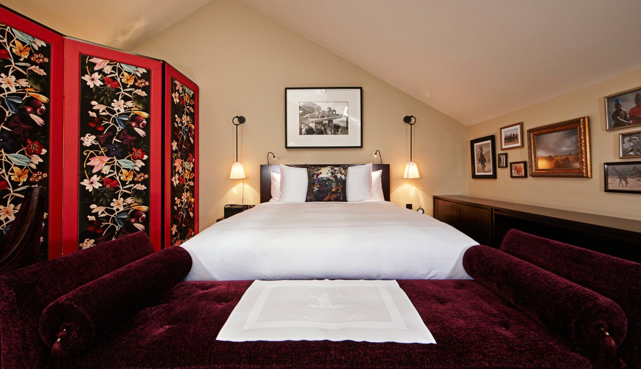 <strong>Vagabond Club:</strong> Guest rooms feature hand painted screens and framed pictures liberally lining the wall.