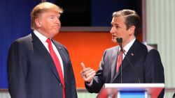 Republican presidential candidates (L-R) Donald Trump and Sen. Ted Cruz (R-TX) speak during a commercial break in the Fox Business Network Republican presidential debate at the North Charleston Coliseum and Performing Arts Center on January 14, 2016 in North Charleston, South Carolina. 