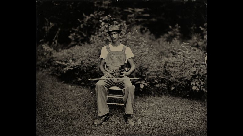 Matthew McElroy sits for his portrait.