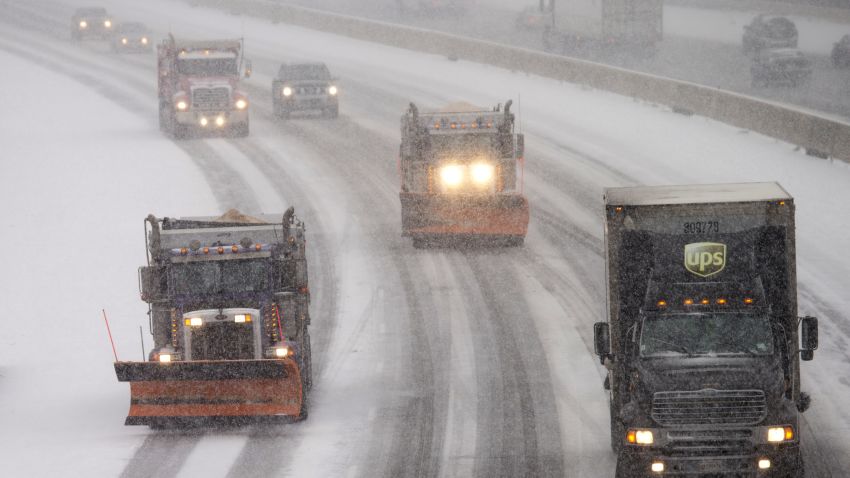 Snow plows and traffic make their way north along Interstate 95 as snow begins to fall in Ashland, Va., Friday, Jan. 22, 2016. Portions of Virginia are under a blizzard warning. (AP Photo/Steve Helber)