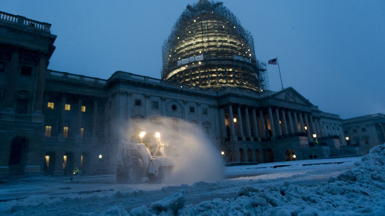 Crews clear the East Plaza at the U.S. Capitol as they try to keep up with the heavy snow on January 22. 