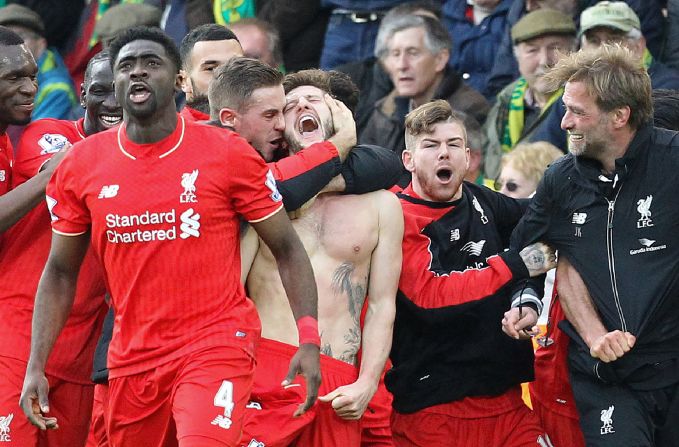 The England international celebrates with his delighted manager.