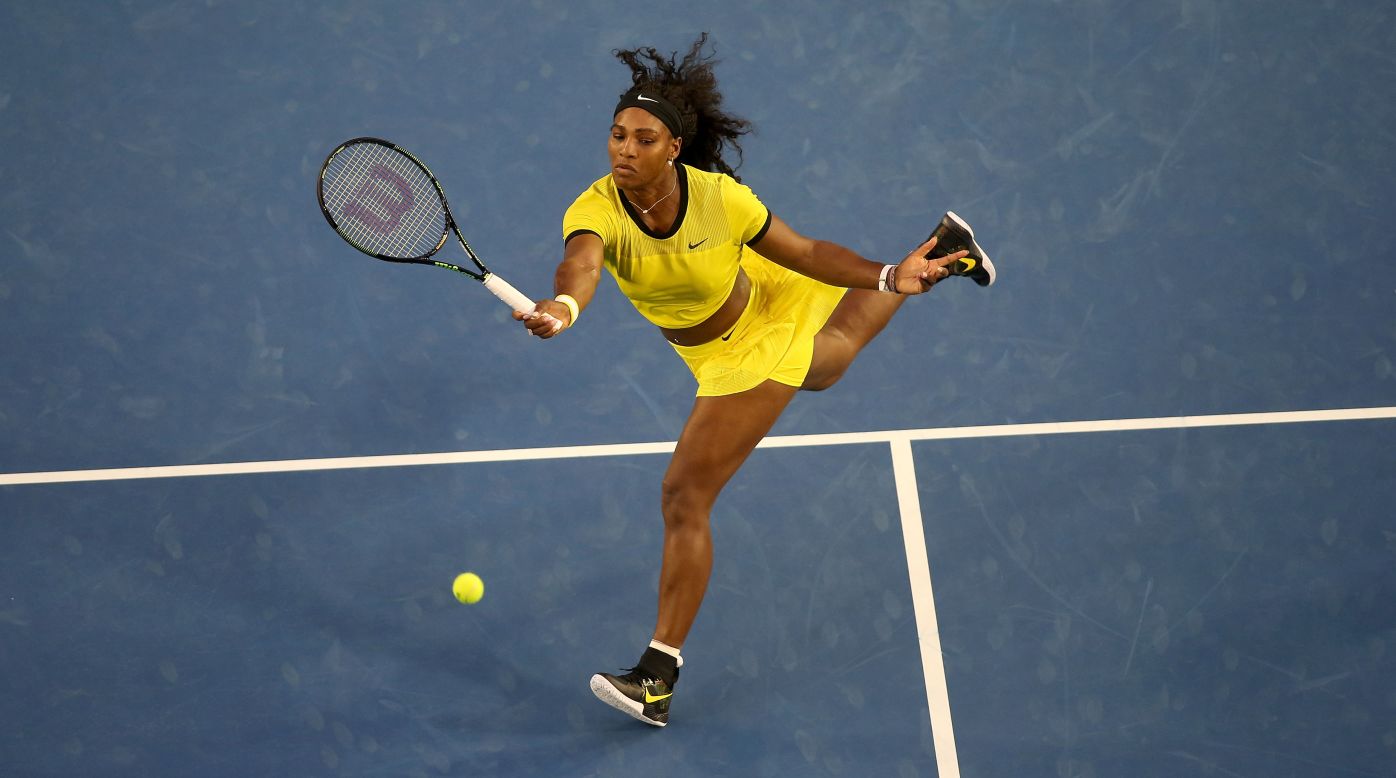 Williams powers a forehand as she continued her march to the last eight of the Australian Open in the defense of her title.