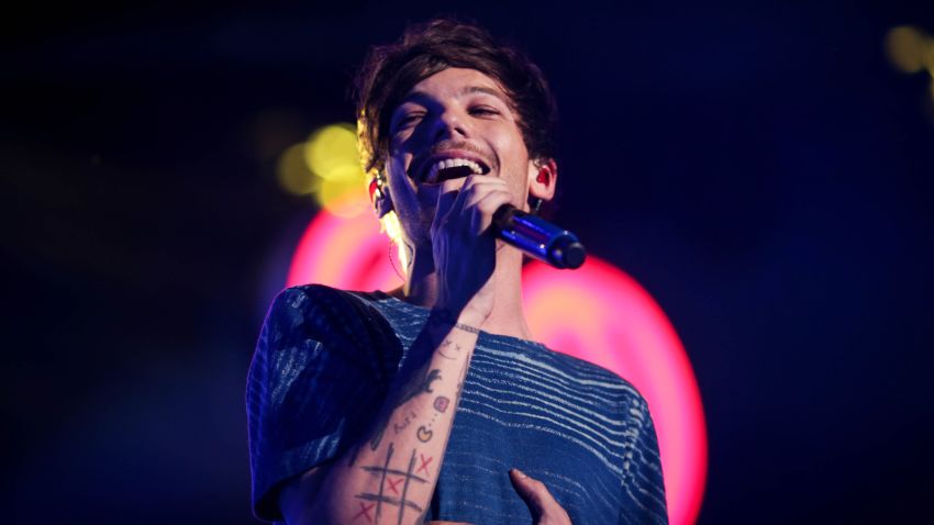 LOS ANGELES, CA - DECEMBER 04:  (EDITORS NOTE: IMAGE WAS PROCESSED USING DIGITAL FILTERS)Recording artist Louis Tomlinson of music group One Direction performs onstage during 102.7 KIIS FMs Jingle Ball 2015 Presented by Capital One at STAPLES CENTER on December 4, 2015 in Los Angeles, California.  (Photo by Christopher Polk/Getty Images for iHeartMedia)