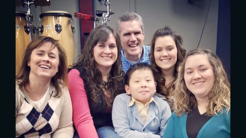 Jeri and Brian Wilson, with their three daughters and son, JiaJia.