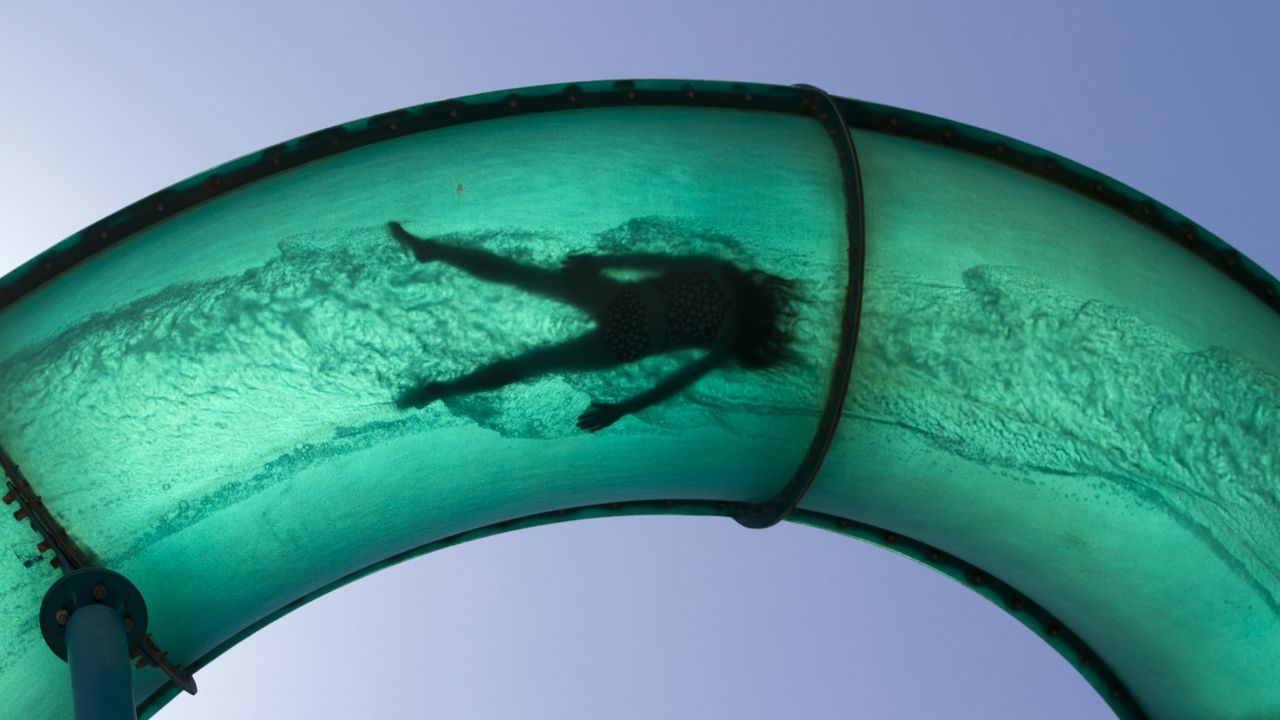A water slide at the Beachouse entertainment center provides relief in early January. Later in the month, severe thunderstorms hit the region, leaving more than 20,000 properties without power. 