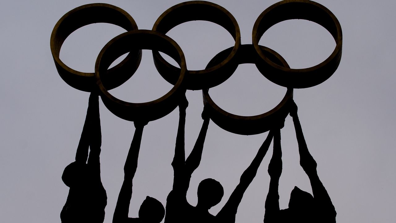 A sculpture representing people carrying the Olympics rings at the IOC's Lausanne offices.