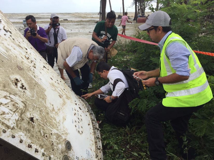 Experts inspect the rivets on the debris. They tell CNN although bolts and rivets are used on a 777 aircraft's frame, they would not appear on the external fuselage of a plane. This brings into question whether the debris could be a part of MH370.