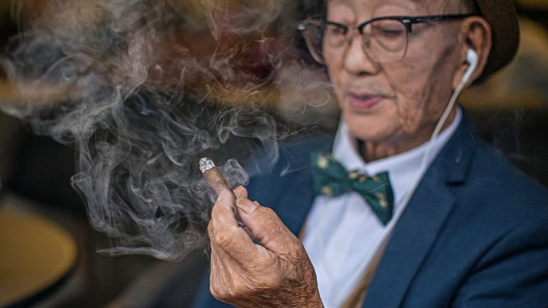 Ding Bingcai, a 85-year-old grandpa, who's tended rice paddies all his life, has become an unlikely style icon in China.