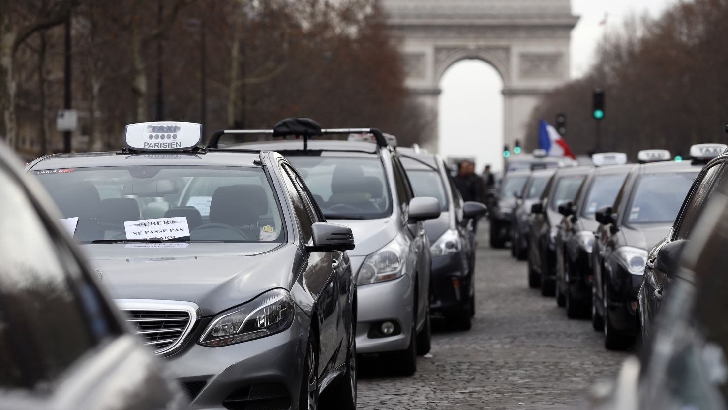 Taxi drivers protest  Tuesday in Paris against competition from Uber-like companies.
