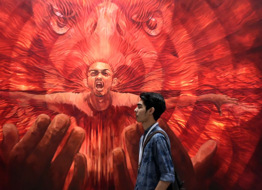 The Malaysian artist showcased a series of oil on canvas paintings, including the above "Resurrection."