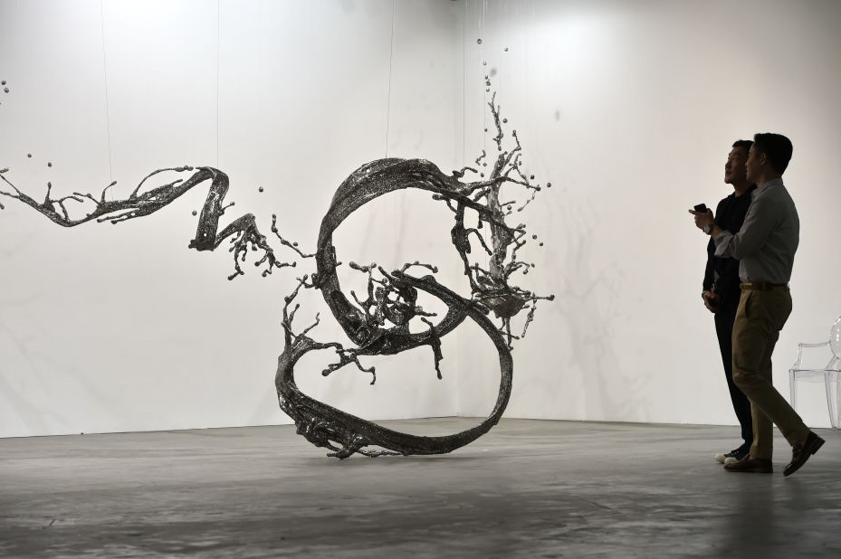 The Chinese artist uses stainless steel to create stunning sculptures based on water formations.  