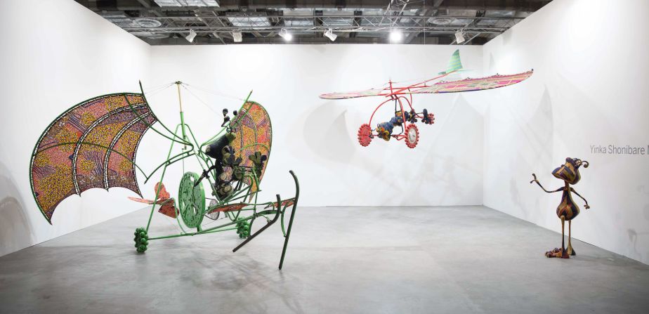 Shonibare's "Alien Man on Flying Machine," "Alien Woman on Flying Machine"  and "Alien Child" -- pictured above -- are part of his series <em>Invasion, Escape: Aliens Do it right!</em>