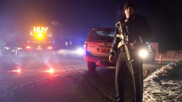 Sgt. Tom Hutchison stands in front of an Oregon State Police roadblock on Highway 395 on Tuesday, January 26, 2016 between John Day and Burns, Oregon.  The FBI on Tuesday arrested the leaders of an armed group that has occupied a federal wildlife refuge in eastern Oregon for the past three weeks.