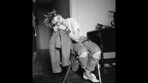 Before the release of her debut album, Madonna sits in her apartment on the Lower East Side of New York in 1983.