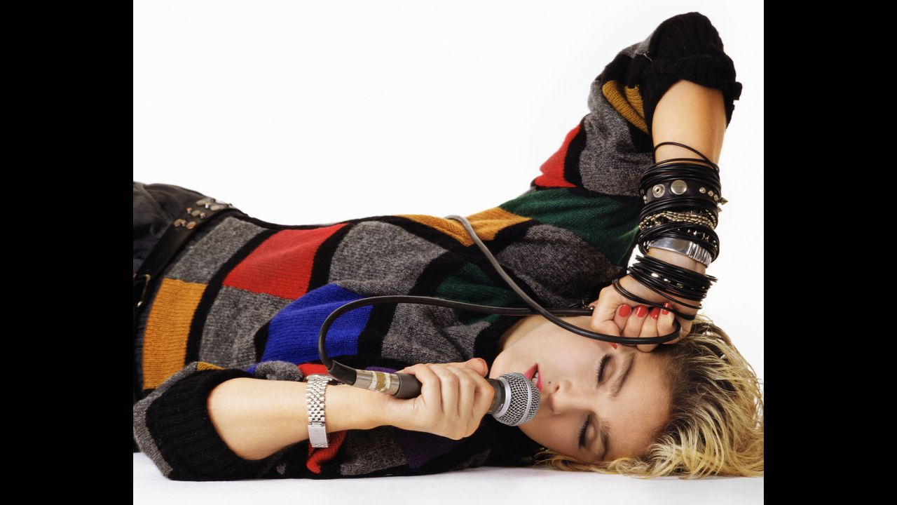 Madonna wears a geometric sweater in an editorial shot for a magazine in 1983.