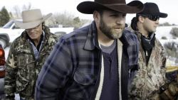 Ammon Bundy makes his way from the entrance of the Malheur National Wildlife Refuge Headquarters in Burns, Oregon on January 6, 2016. A small group of armed activists remained holed up at a remote US federal wildlife refuge in Oregon, vowing to leave only if asked by local residents. AFP PHOTO/ ROB KERR / AFP / ROB KERR        (Photo credit should read ROB KERR/AFP/Getty Images)
