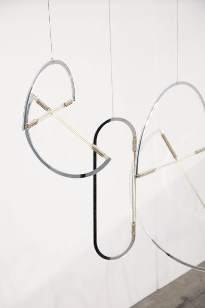 Elkeland is a visual studio based in a cabin deep in the Danish countryside. Designer Ida Elke creates unusual products in solitude, there, including these mirrored geometric mobiles. 