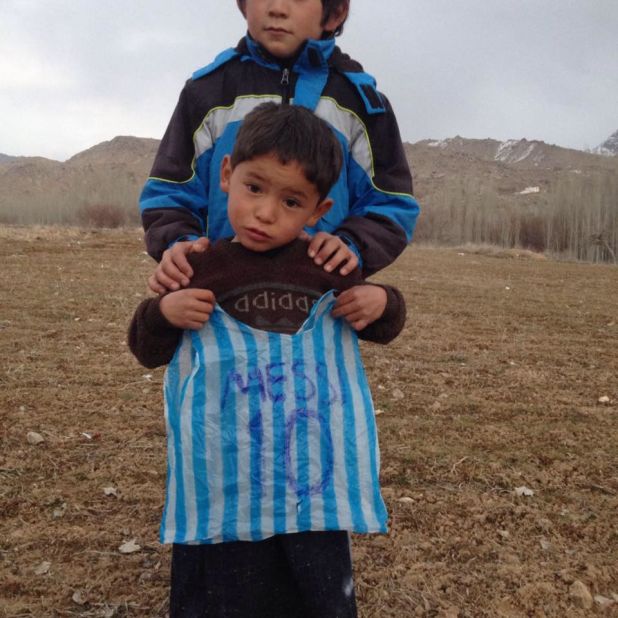 Murtaza holds the plastic bag that made him famous. His father,  Muhammad Arif Ahmadi, told CNN the five-year-old's brother made it for him when he wouldn't stop crying. "I told him that we were living in a poor village far from the city and it was impossible for me to get him the shirt," he said.