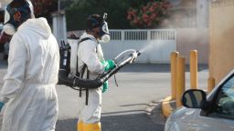 Workers fumigate in the streets of Recife on Tuesday, January 26.